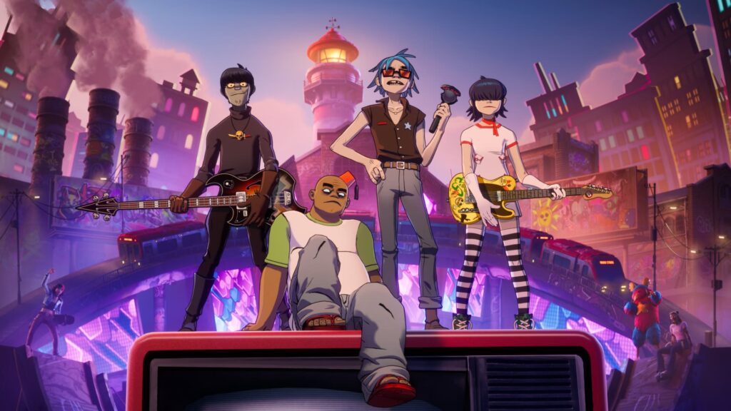 Banda dei Gorillaz in stile Fortnite: 2D, Murdoc, Russel e Noodle posano su un palco sul tetto in mezzo a un paesaggio urbano pieno di fumo e luci al neon