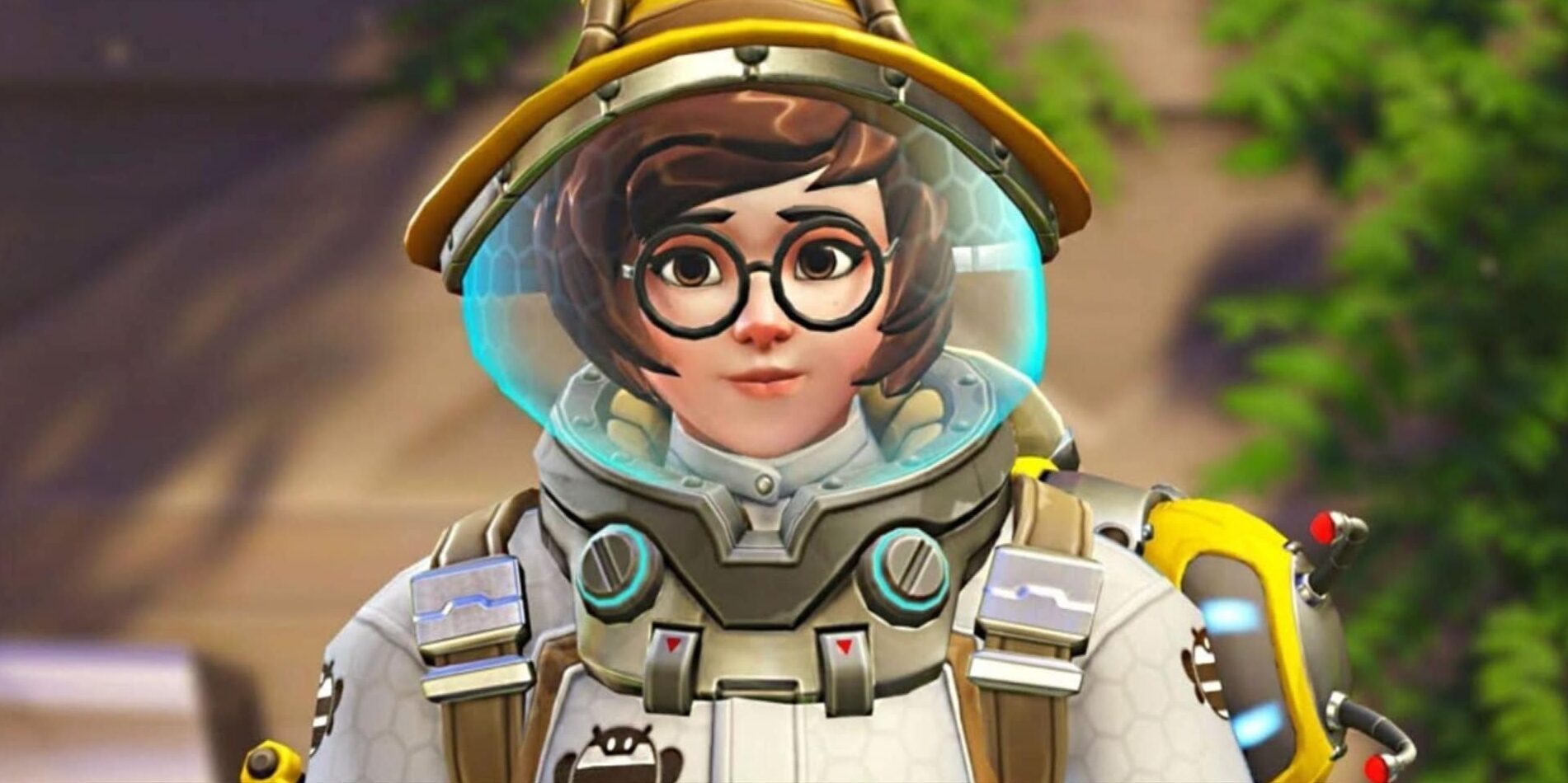 Mei in her Beekeeper skin from Overwatch 2, wearing a white suit with a clear helmet and bee-themed gear