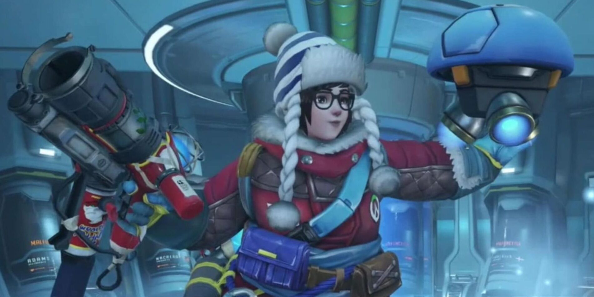 Mei in her Ecopoint: Antarctica skin from Overwatch 2, wearing a red winter jacket, striped pom-pom hat, and holding a cryo-device in a high-tech arctic facility