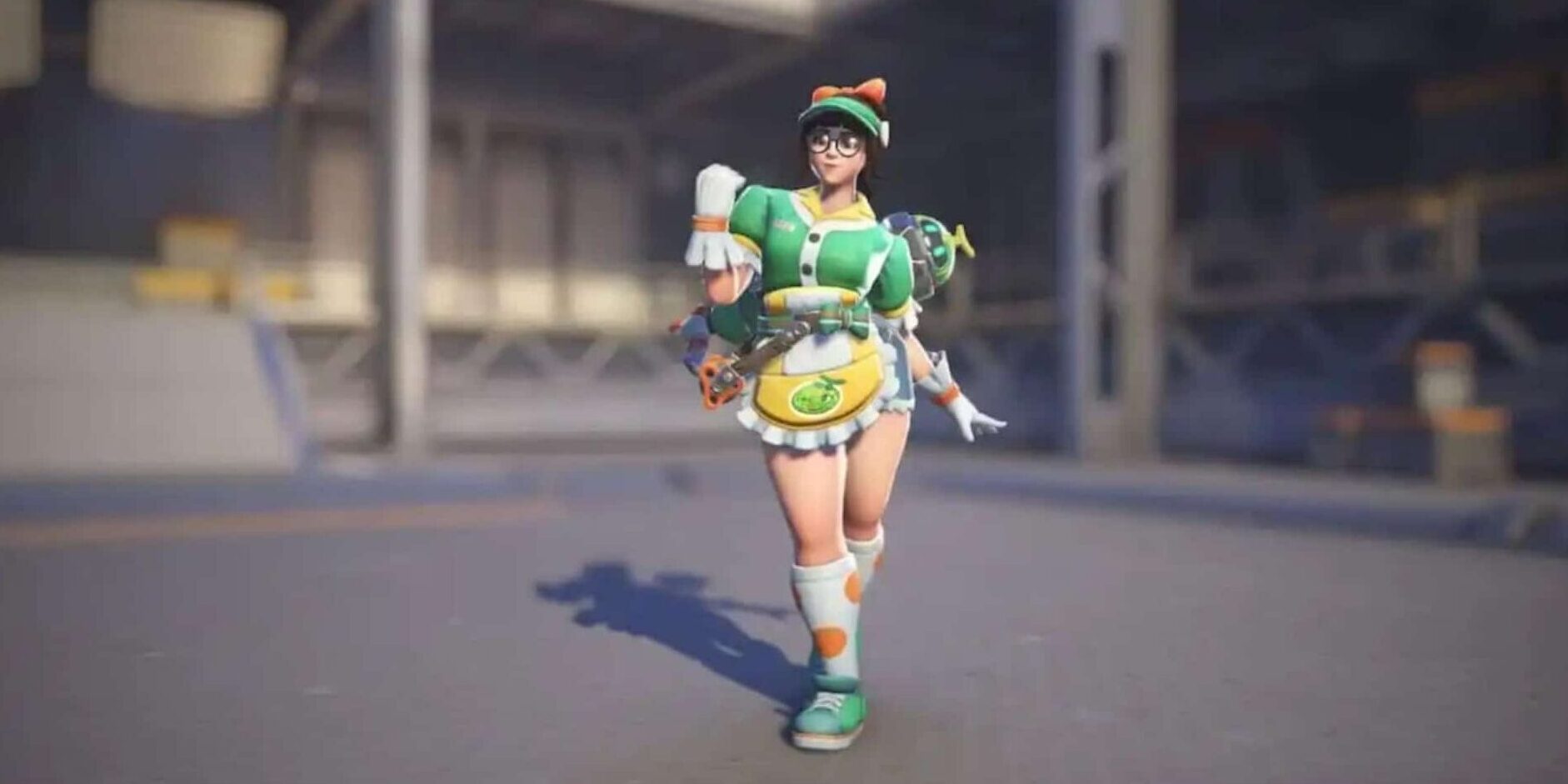 Mei in her Honeydew skin from Overwatch 2, wearing a green and white waitress outfit with an apron and bow