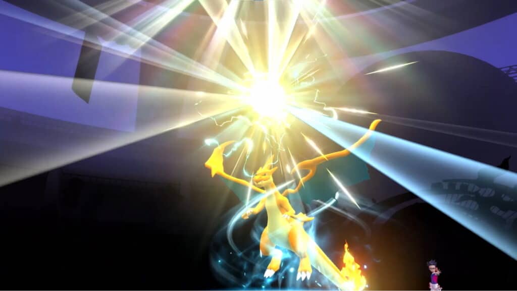 Das Bild zeigt das Feuer-/Flug-Pokémon Mega Charizard Y in einer Evolutionssequenz im Spiel, das einen hellen Licht- und Energieblitz ausstrahlt