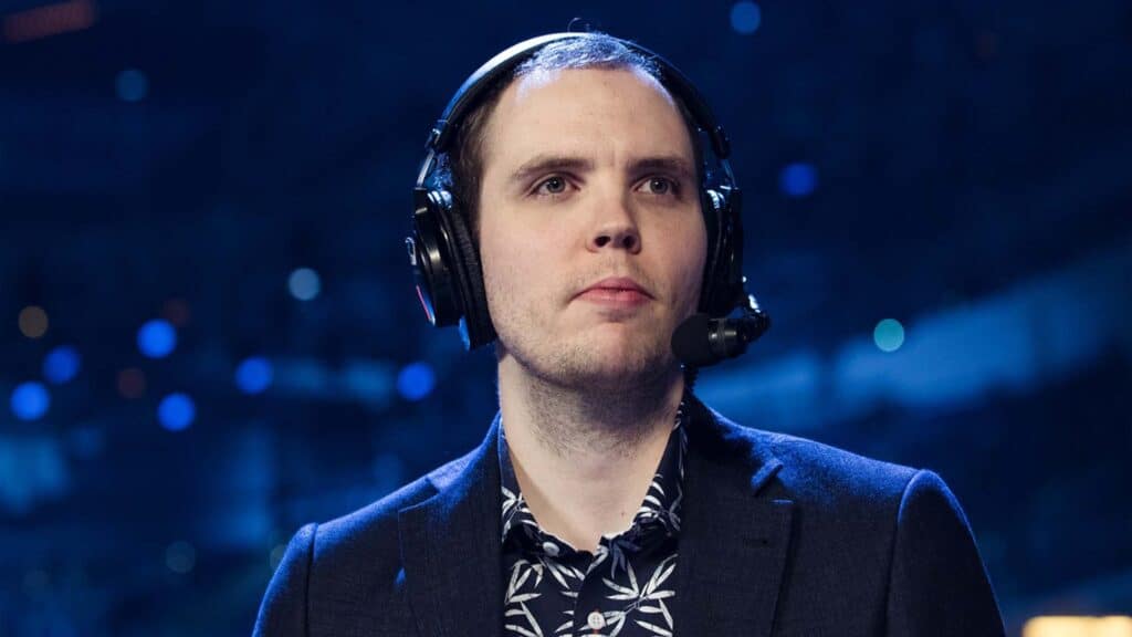 TI 2013 winner Admiral 'AdmiralBulldog' Bulldog wearing a headset on a dark background