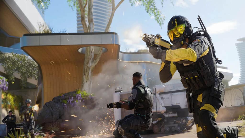 Bild eines Call of Duty Black Ops 7-Spielers, der eine Maschinenpistole abfeuert. Im Hintergrund schießt ein Gegner mit einer Waffe auf einen Teamkollegen in der Nähe