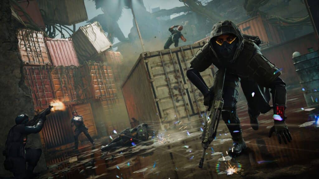 Counter-Strike 2 operators engage in a firefight inside a shipping container yard