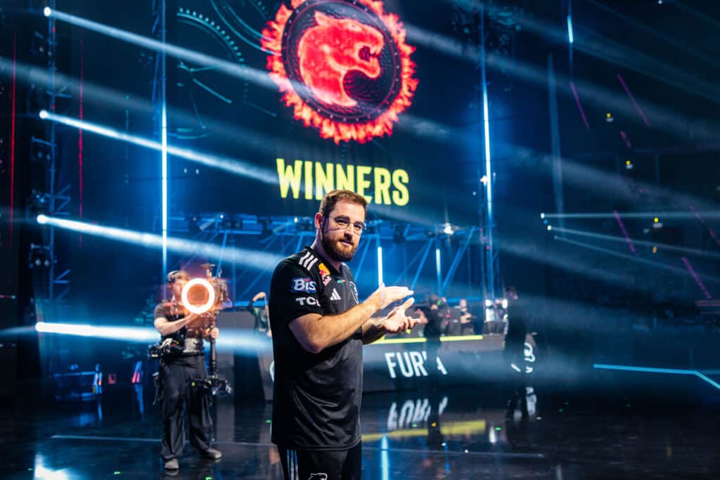 Image of FURIA Counter-Strike player FalleN applauding while on stage at IEM Krakow 2026